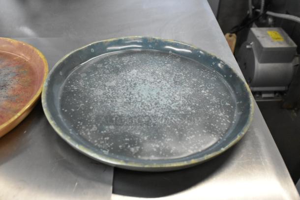 3 brand new cheforward™ by GET Savor 10" round melamine plates in clay azul iris, dusk, and spruce. Slight scratches.