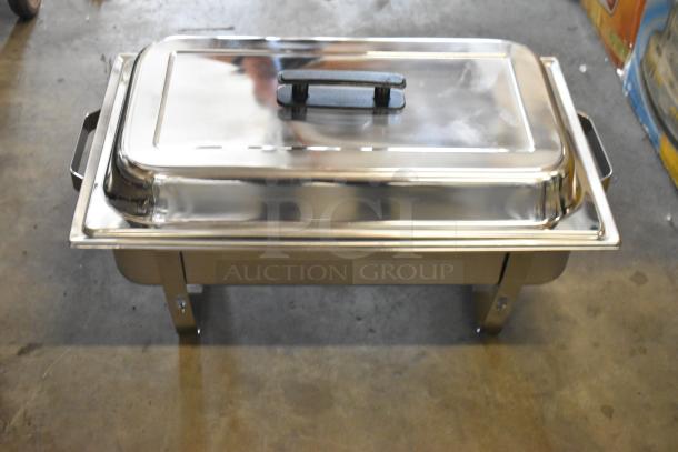 Brand new stainless steel chafing dish with minor scratches. Scratch and dent item. Durable with lid and handles.