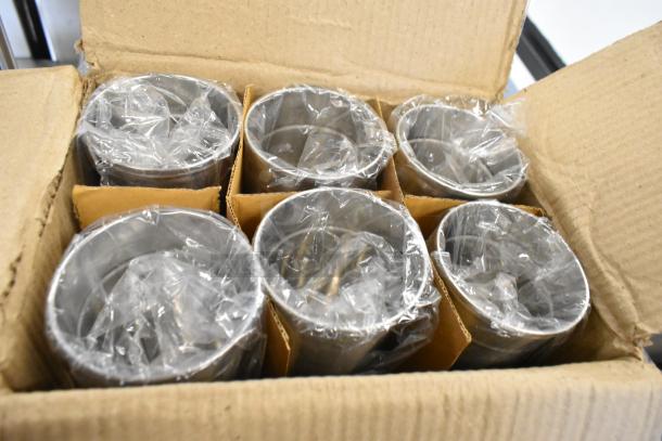 Box of 12 Libbey JC-26 15 oz. etched stainless steel mint julep cups, individually wrapped, scratch and dent condition.