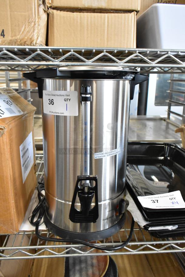 Brand new Avantco 177CU45ETL 45-cup stainless steel coffee urn, scratch and dent condition, with visible caution label and auction tag.