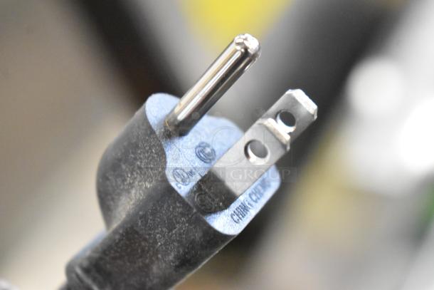 Close-up of a plug from a 2025 Avantco 177CU45ETL 45 Cup Coffee Percolator, 120V, brand new condition.