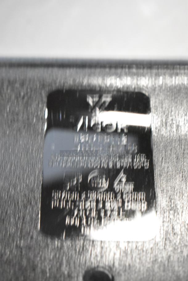 4 Brand New Vigor Black Poly Full Size Drop-In Bins, scratch and dent, image shows dim label details and textured surface.