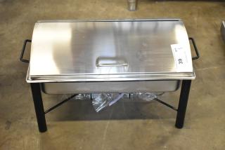 Stainless steel countertop chafer, brand new with minor scratches, includes lid and black handles, auction tag visible.