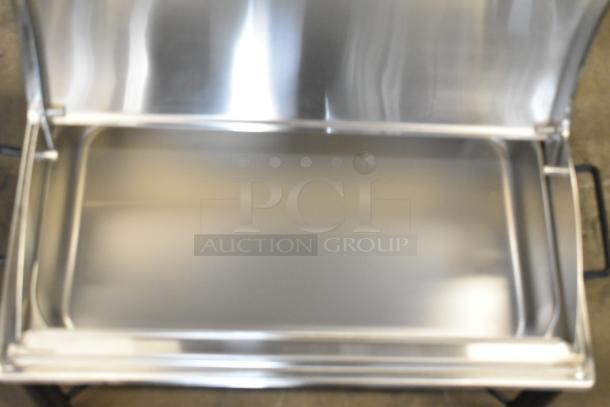 Stainless steel countertop chafer, brand new with minor scratches and dents, polished surface, sturdy frame.