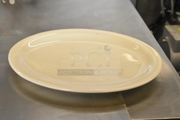 Three boxes of white ceramic plates, new with minor flaws. Each box contains two plates. Increased value auction item.