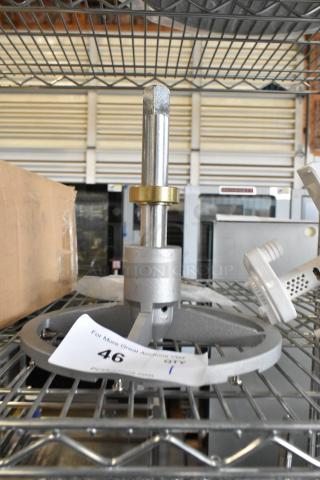 Brand new commercial pelican head blade holder, metal, scratch and dent condition, positioned on metal rack.