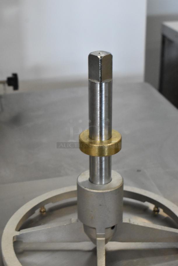 Brand new metal commercial Pelican head blade holder. Scratch and dent condition, sturdy design, visible metal finish.