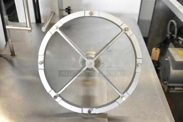 Brand new metal Pelican Head blade holder with minor scratches and dents. Features sturdy construction and visible bolts.