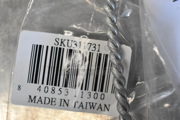 Brand new SKU311731 wire brush, label showing barcode and "Made in Taiwan" marking.