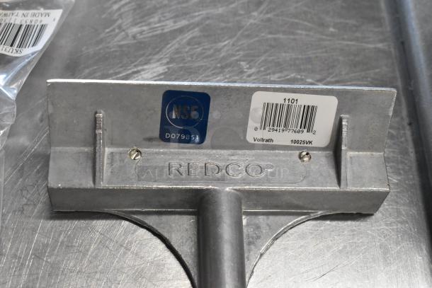 2 new scratch and dent items: SKU311731 wire cleaning brush and Vollrath Redco 10025VK metal scraper, NSF certified.