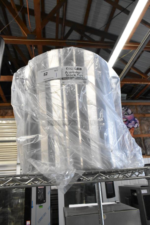 Brand new Choice 471SP60QT 60 Qt. aluminum stock pot, wrapped in plastic, labeled with quantity and auction site info.