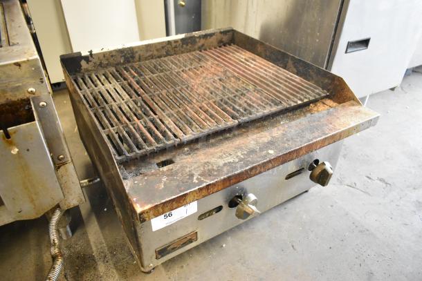 Copper Beech stainless steel gas charbroiler grill, commercial countertop design, showing signs of use with visible markings and controls.