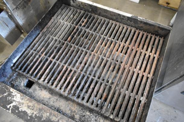 Copper Beech stainless steel charbroiler grill, gas powered, commercial countertop model, showing used cooking grates.