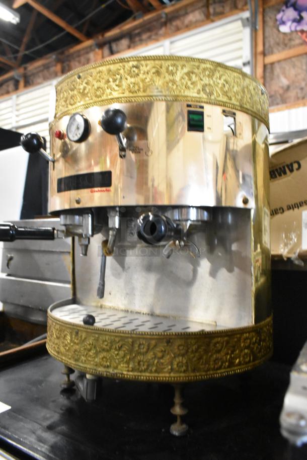 Grindmaster 2100Q Espressimo metal commercial espresso machine, 2 group, with 2 portafilters and steam wand, ornate detailing.