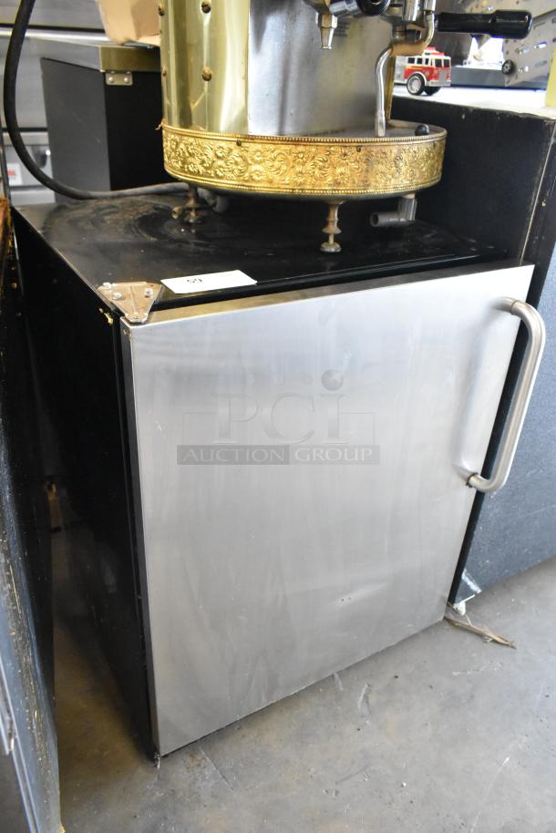 Summit SCFF55BBI undercounter freezer, single door, stainless steel, model visible, industrial setting, 115 volts.