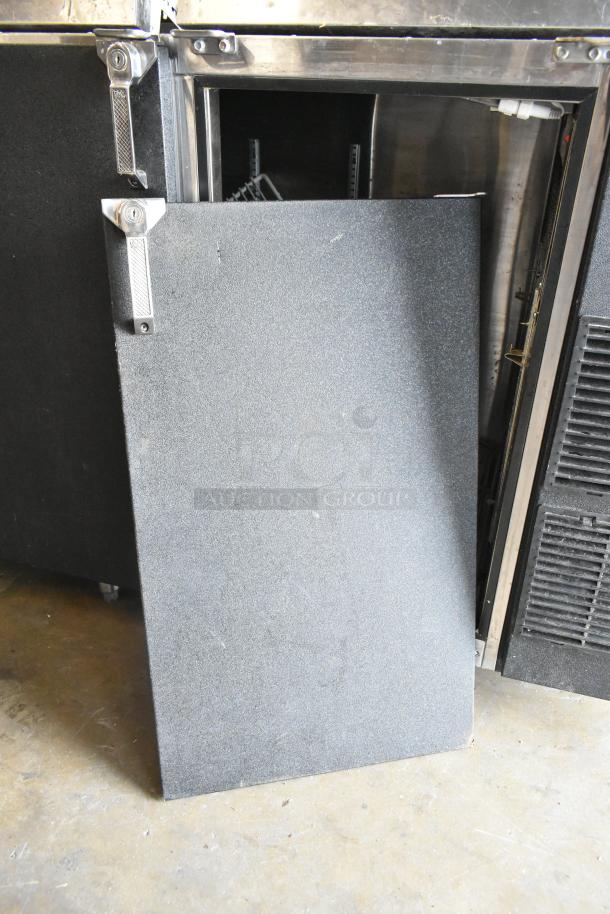 Glastender ND72-R1-BN(LLR) commercial back bar cooler, 3-door, metal, with visible open door, in used condition.