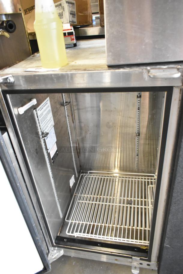 Glastender ND72-R1-BN(LLR) 3-door back bar cooler, metal, open door view, shelves visible, 115 volts, 1 phase.