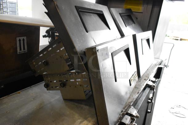 Stainless steel commercial freezer drawers in good condition, featuring True brand design; ideal for undercounter use.