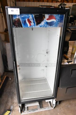 True GDM-12 single door cooler merchandiser, 115 volts, 1 phase; used condition with Pepsi branding, model details.