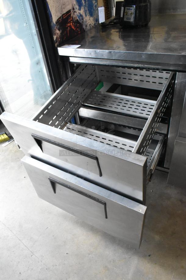 True TWT-93D-6 stainless steel undercounter cooler with 6 drawers on commercial casters, 115V, 1 phase, excellent condition.