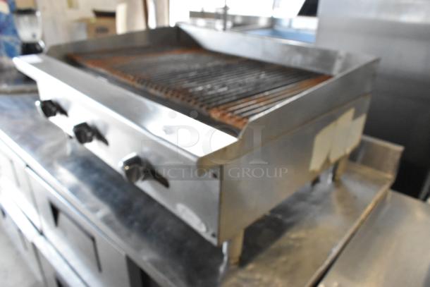 Atosa stainless steel commercial countertop gas charbroiler grill, featuring three control knobs, in used condition.