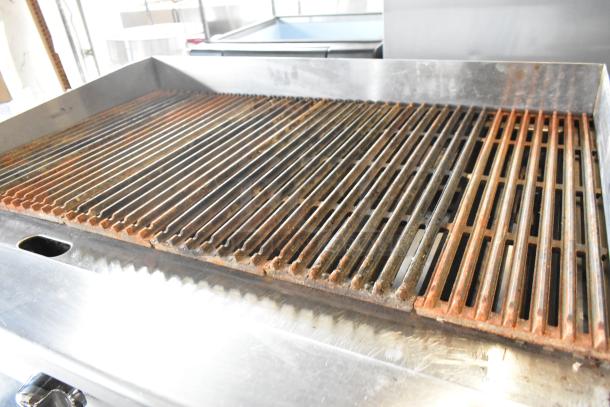 Atosa stainless steel commercial countertop gas charbroiler grill, showing rust on grates, suitable for restaurant use.