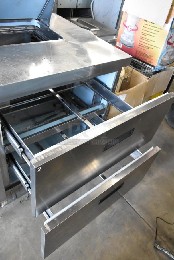 Delfield UCD4464N-12-DD5 stainless steel commercial sandwich salad prep table with 4 drawers, used condition.