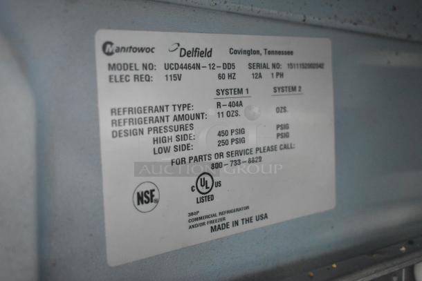 Delfield UCD4464N-12-DD5 stainless steel prep table label showing model, refrigerant type, and electrical requirements.