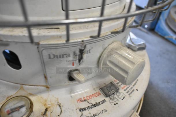 Dura Heat DH-D Floor Style Kerosene Heater; visible wear, control knob, safety cage, model label.