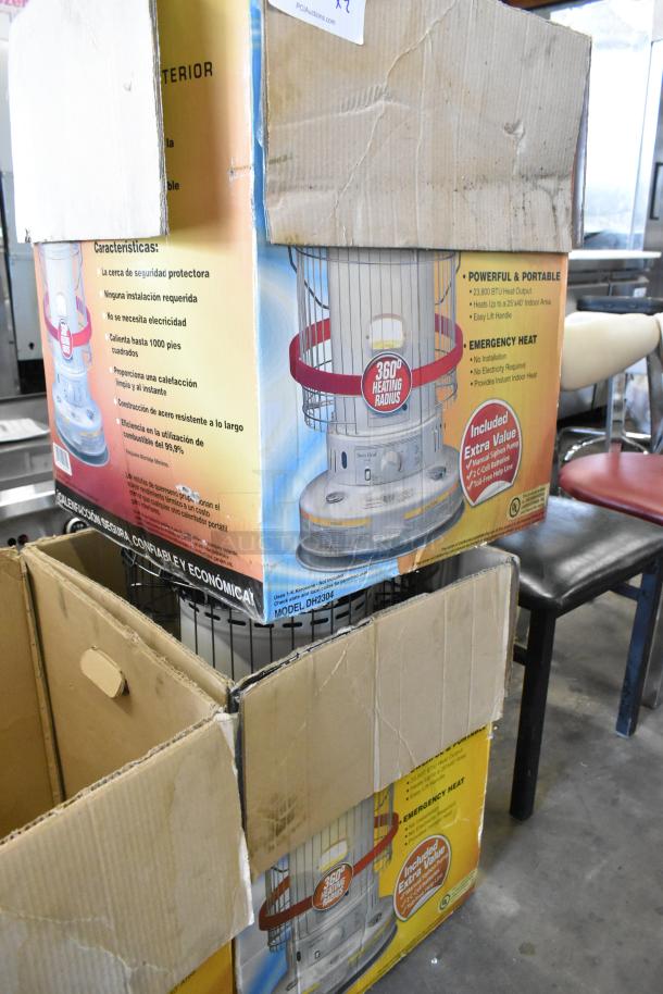 2 Dura Heat DH-D floor-style kerosene heaters in original boxes, model DH2304, 23,800 BTU output, powerful and portable.