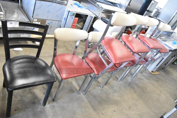 10 dining height metal chairs, mix of black with black seat cushions and chrome with red seat cushions. Some wear visible.