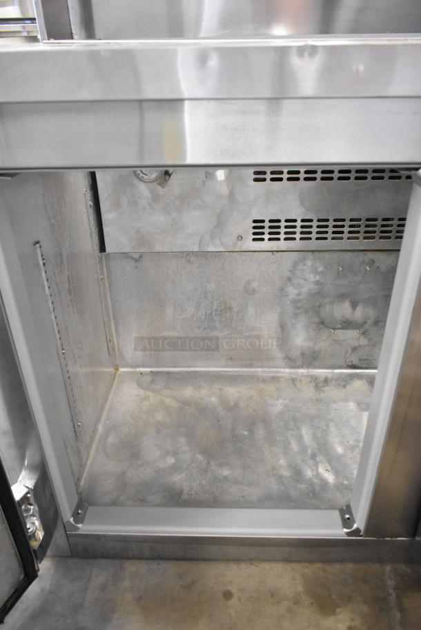 Migali CA-4-12 stainless steel prep table, missing lid. Features bain marie mega top, 115 volts, 1 phase, commercial use.