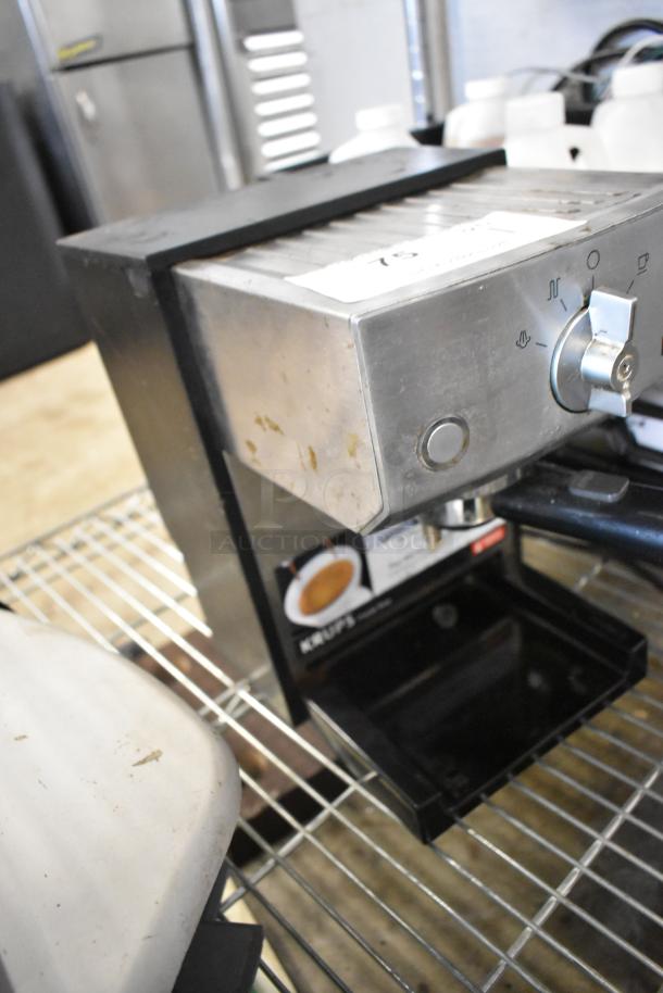 Krups XP524 espresso machine with portafilter, countertop model, stainless steel, visible controls, 120V, single group.