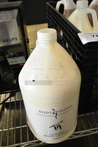 Body Eclipse Eucalyptus Body Lotion jug. Professional spa product, 1 gallon. Offers six-time bid value with additional items.