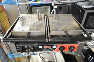 Sirmann stainless steel double panini press, commercial countertop model. Features manual controls, 208 volts, 1 phase.