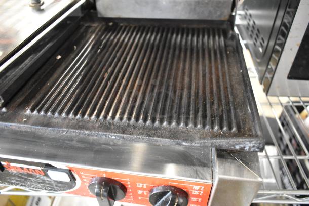 Sirmann stainless steel commercial countertop double panini press, 208 volts, 1 phase, with ribbed plates and control knobs.