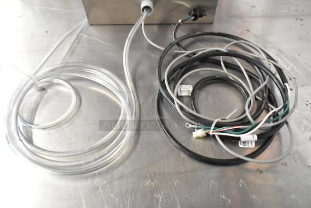 2018 Manitowoc IAuCS-161 Indigo Automated Ice Machine Cleaning System, 115V, with visible wires and tubing in good condition.