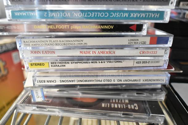 Assorted lot of classical music CDs, including Rachmaninov, Beethoven, and Tchaikovsky. Visible labels, good condition.