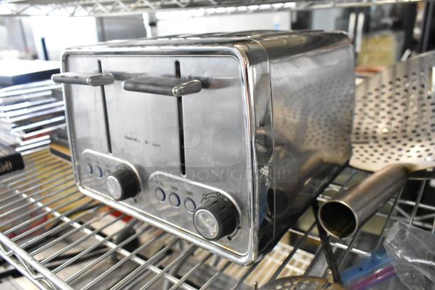 Hamilton Beach metal countertop 4-slot toaster, 115 volts, 1 phase, good condition, dual control knobs, stainless finish.