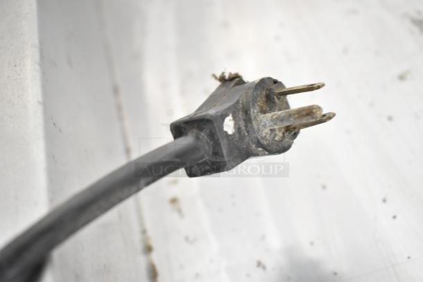 Damaged power cord plug for Hamilton Beach Metal Countertop 4 Slot Toaster. 115 Volts, 1 Phase. Visible wear and grime.