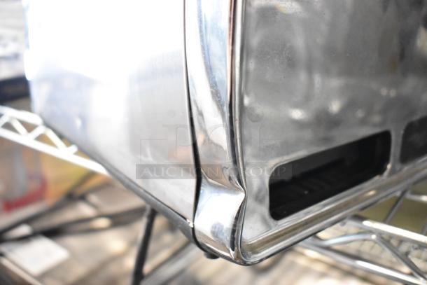 Hamilton Beach Metal Countertop 4 Slot Toaster, slight dent, 115 Volts, 1 Phase, stainless steel finish.