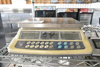 CK-30 countertop scale, model CK-30, with digital display and keypad. Capacity: 30 lb x 0.005 lb. 110V, 1 Phase. Fair condition.