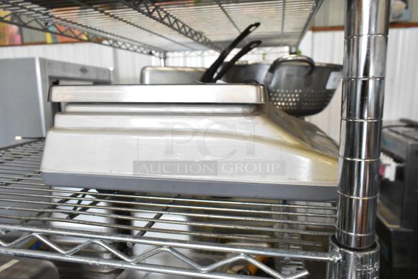 CK-30 Countertop Scale, model CK-30, 110 volts, 1 phase, stainless steel, good condition, displayed on wire shelf.