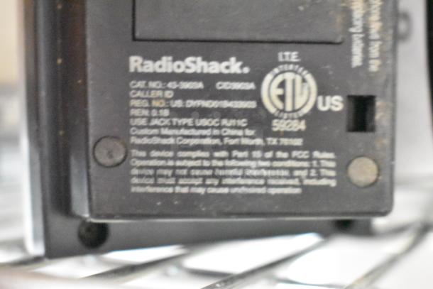 RadioShack Caller ID device, Cat No. 43-3909A. Features regulatory markings and compliance details. Good condition.