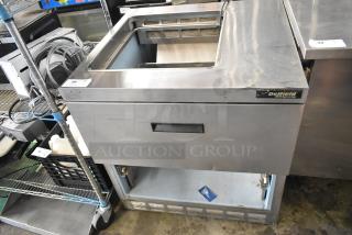 Delfield UCD4432N-9M-DD1 stainless steel commercial prep table, 2 drawers, missing one drawer, 115 volts, 1 phase, visible wear.