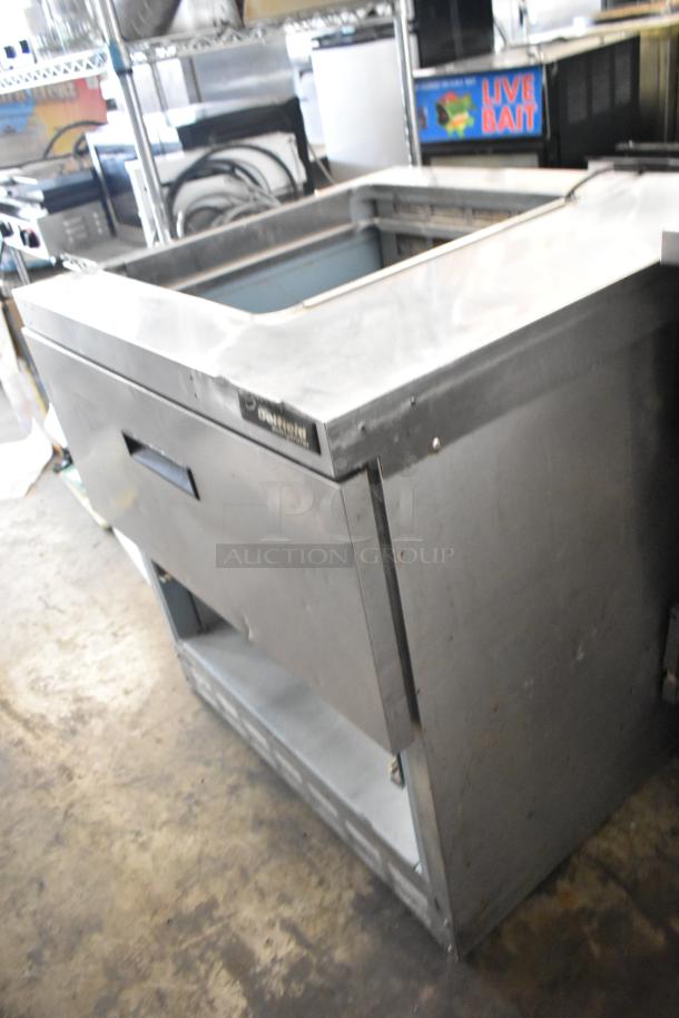 Delfield UCD4432N-9M-DD1 stainless steel commercial prep table, 2 drawers, 1 missing, 115V, 1 phase, used condition.