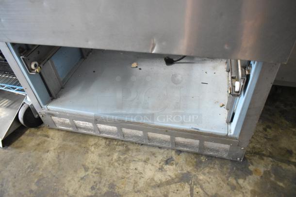 Delfield UCD4432N-9M-DD1 stainless steel prep table, missing drawer, 115 Volts, 1 Phase, used condition.