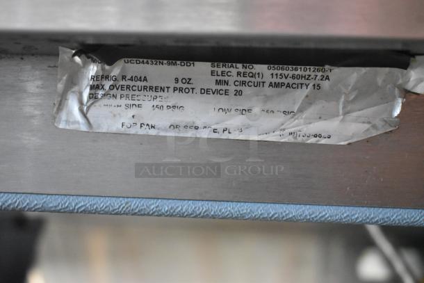 Delfield UCD4432N-9M-DD1 stainless steel prep table with 2 drawers, 1 missing. Label shows 115V, 1 phase, Model: UCD4432N-9M-DD1.