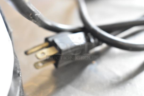 Close-up of the power cord and plug for a Waring NuBlend BB180 Metal Countertop Blender. 120 Volts AC.