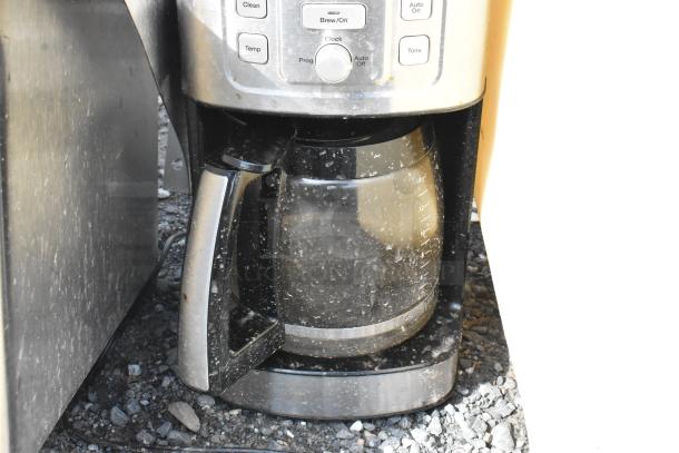 Cuisinart countertop coffee machine with glass coffee pot. Features control panel, 120 volts, 1 phase. Used condition.